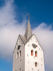 Fototapeta premium Tower of white Gothic brick church in Thisted, Nordjylland, Denmark