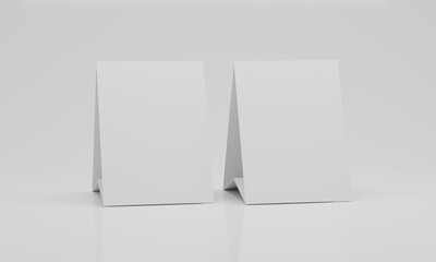Mock up blank white Table Tent isolated on white background. template for designers design presentation, showcase etc, copy space for your logo or graphic design. Paper vertical card 3d render
