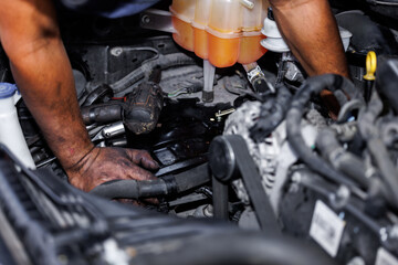 auto mechanic working repairing engine