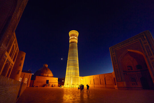 illuminated Kalyan minaret at night in Bukhara