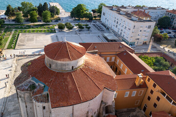 Aerial view of the old town of the beautiful Croatian city Zadar and to the adriatic sea. Church of St. Donatus of Zadar, Stup srama (Pillar of shame), Benedictine Monastery of St. Maria, Croatia