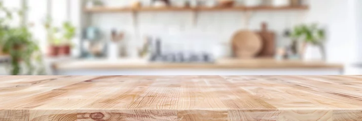 Fotobehang Empty beautiful wood table top counter and blur bokeh modern kitchen interior background in clean and bright,Banner, Ready for product montage   © Planetz