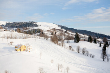 Fototapeta na wymiar Winter landscape with curvy road