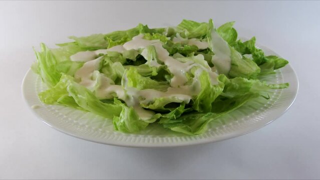 Preparation of Caesar salad with salmon. Stop motion.