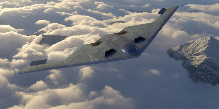 northrop grumman b 2 spirit bomber flying above the clouds