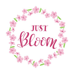 Spring calligraphic card with floral wreath. Cherry blossom isolated on white background. Slogan Just Bloom. Modern spring concept in pastel colors. Easter spring concept
