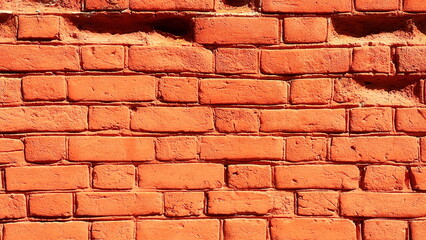Sunlit Red Brick Wall Texture Background