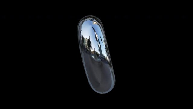 Rotating 3d retro shiny chrome metallic silver abstract inflated ballon torus donut shape. Y2k shape, rave, retro, 90&rsquo;s, 80&rsquo;s style isolated on black background with alpha matte.