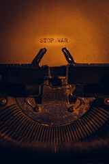 STOP WAR typed words on a vintage typewriter. Close up. Antique Typewriter.