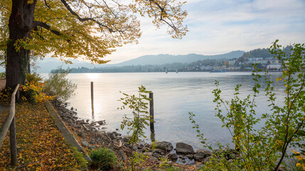 peaceful scenery at lake shore Traunsee in autumn, tourist destination Gmunden, Salzkammergut