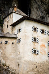 Fototapeta na wymiar Predjama Castle, Predjamski grad or Grad Predjama » Postojna Cave Park stone castle embedded in the mountain Slovenia