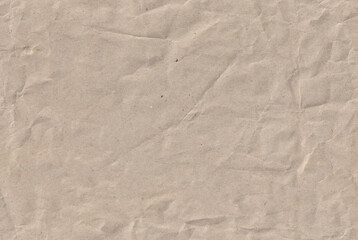 Seamless crumpled kraft paper texture. Empty textured sheet.