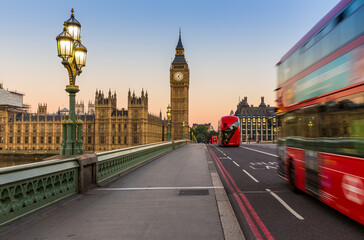 Fototapeta na wymiar Big Ben and red buses in London