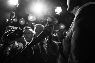 Fotobehang A politician, instead of delivering a conventional speech, starts beatboxing into the reporters' microphones, surprising everyone with their hidden talent. © HASAN