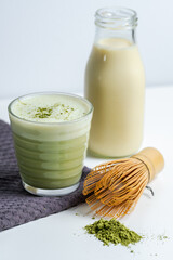 Green matcha tea mixed with milk. Matcha Latte drink
