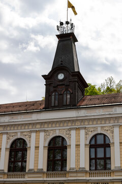 Ljubljana, Slovenia; Lutkovno gledališče (Ljubljana Puppet Theatre) con torre de teloj, next to the Ljubljana Castle Funicular.
