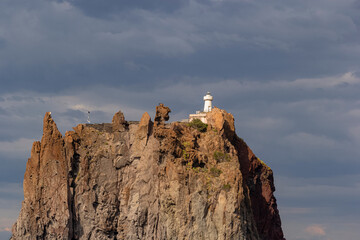 Strombolicchio Lighthouse placed on the summit of a sea stack 1 nautical mile to the Stromboli in...