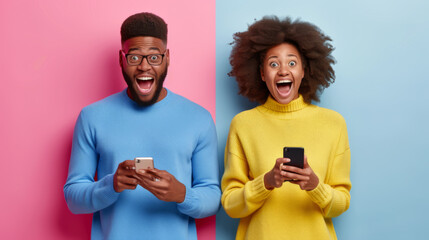 man and a woman are standing against a split background, pink and blue, respectively