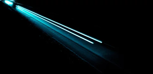 Tuinposter blue car lights at night. long exposure © Krzysztof Bubel