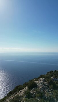The island of Es Vedra and Pirates Tower. Vertical video.