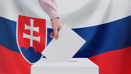 Elections in Slovakia. Voting concept. A hand throws a ballot into the ballot box. Flag of Slovakia...