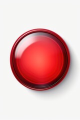 A red button placed on a clean white surface. Suitable for technology and business concepts