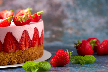 Strawberry cake. Menu concept. Homemade strawberry cake decorated with strawberries and mint leaves