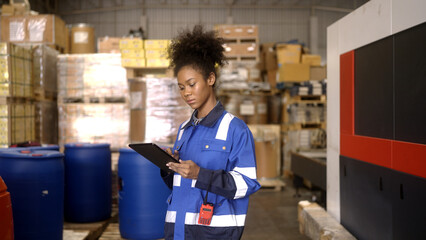 Female worker counting goods in warehouse - 758225045