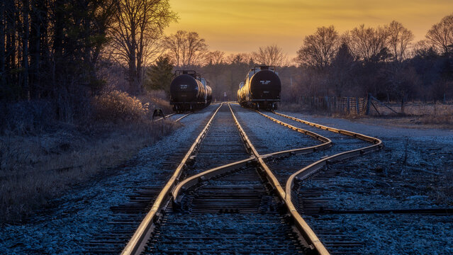Railway tracks during a golden sunset