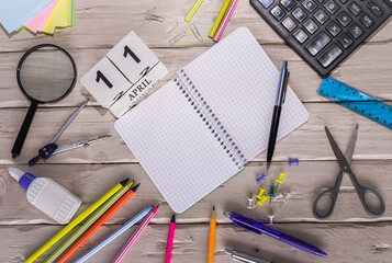 April calendar with number  11. Copy of space note. Top view of blank notepad. Space for text in a...