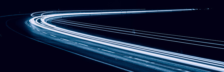 blue car lights at night. long exposure