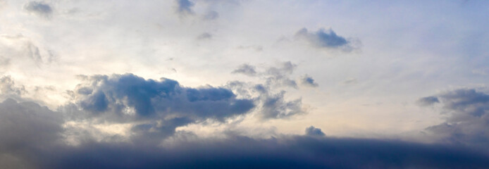 Obraz premium Dark blue clouds in the evening sky