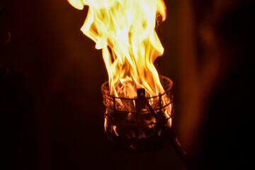 Flames of a coppara torch that lighting in Kandy Esala Perahera at Temple of the Tooth (Sri Dalada...
