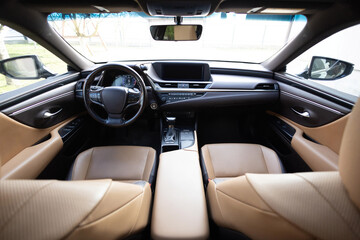 Luxury car interior. Car detailing series. Prestige modern car. Inside car interior with front...