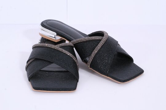 Picture of women flat chappal. Ladies' Flat Slippers are so easy to style and versatile that a basic wardrobe cannot do without them. easy to wear and take off.