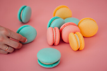 The image is of a hand holding a colorful heart-shaped cookie 6204.