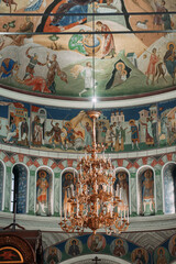 Fototapeta na wymiar The image is a wall with religious art, possibly a fresco, featuring a depiction related to a church or holy place. 6328