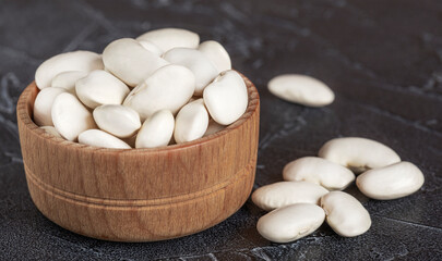 beautiful white beans in a wooden bowl