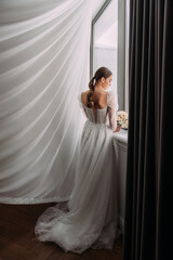 The image features a person wearing a wedding dress 6495.