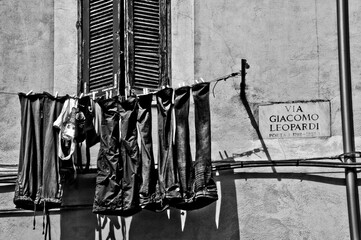 window with shutters and laundry