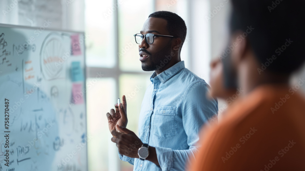 Poster man presenting or explaining something in front of a whiteboard with various colorful charts, diagra
