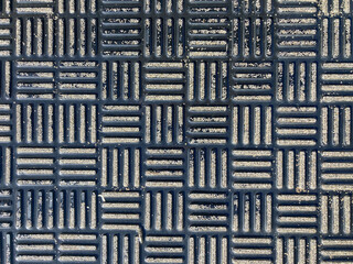 baldosa de cemento con pintura negra pavimento con dibujo geométrico en la acera con textura IMG_5571-as24