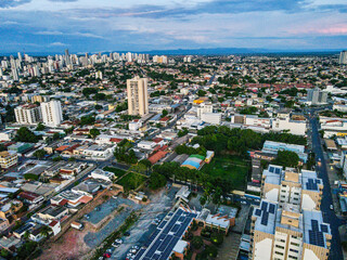 Fototapeta na wymiar Aerial cityscape at sunset during summer in central Cuiaba