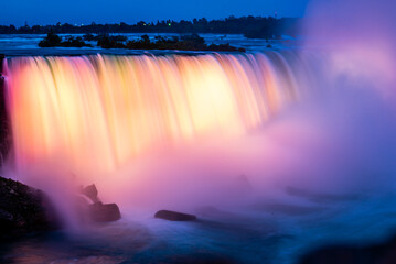 Niagara falls, Canada - June 27 2018: Colorful light shedding on the Niagara Falls