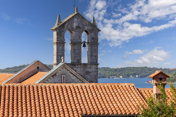 Obraz premium Medieval Monastery and Church of St. Francis with bell tower located on Pula Hill, Pula, Croatia, Istria