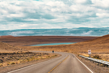 Fototapeta na wymiar Picturesque road with lake view in Santa Cruz province of Argentina