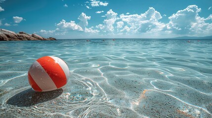 Red and White Ball Floating on Water