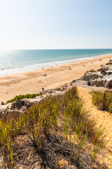 Fototapeta na wymiar Stunning Cliffs and sandy beach at Praia da Falésia, Algarve, Portugal