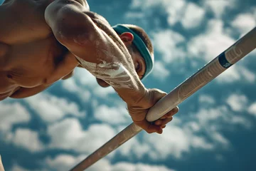 Foto auf Acrylglas a pole vaulter's hands gripping the pole and launching themselves over the bar with precision and power © kashiStock