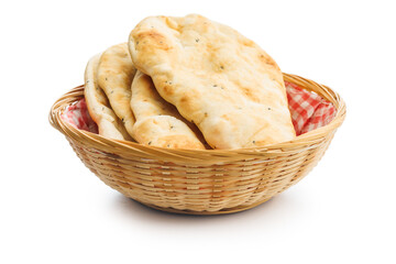 Freshly Baked Naan Bread in basket isolated on white background.